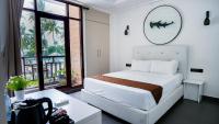 Postel nebo postele na pokoji v ubytování Silver Oasis Maldives