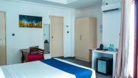 Postel nebo postele na pokoji v ubytování Silver Oasis Maldives