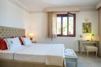 Posteľ alebo postele v izbe v ubytovaní Triena Villas by PaxosRetreats