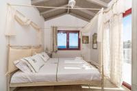 Posteľ alebo postele v izbe v ubytovaní Triena Villas by PaxosRetreats
