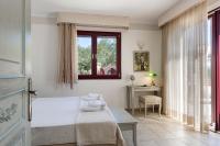 Posteľ alebo postele v izbe v ubytovaní Triena Villas by PaxosRetreats