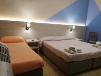 A bed or beds in a room at Cannone d'Oro