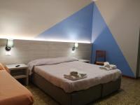 A bed or beds in a room at Cannone d'Oro