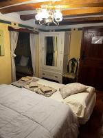 Postel nebo postele na pokoji v ubytování Hotel Casa de la Fuente