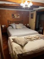 Postel nebo postele na pokoji v ubytování Hotel Casa de la Fuente
