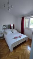 Postel nebo postele na pokoji v ubytování Villa Estera