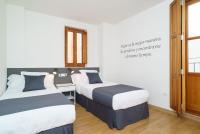 Postel nebo postele na pokoji v ubytování Valencia Home