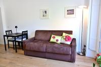 A seating area at AT HOME COLOSSEO
