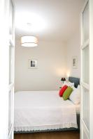 A bed or beds in a room at AT HOME COLOSSEO