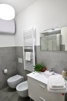 A bathroom at AT HOME COLOSSEO