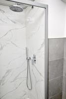 A bathroom at AT HOME COLOSSEO
