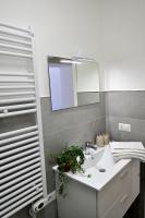 A bathroom at AT HOME COLOSSEO