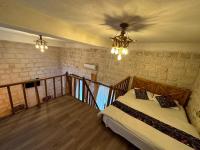 Postel nebo postele na pokoji v ubytování Sikeft Otel