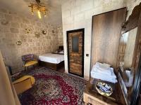 Postel nebo postele na pokoji v ubytování Sikeft Otel