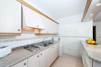 Kuchnia lub aneks kuchenny w obiekcie Apartamentos Xaloc HRC
