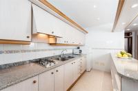 Kuchnia lub aneks kuchenny w obiekcie Apartamentos Xaloc HRC