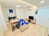 TV a/nebo společenská místnost v ubytování VIP -Apartamentos Birdie-