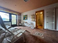 Telewizja i/lub zestaw kina domowego w obiekcie Chalet Josi