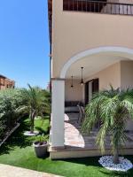 A garden outside HomeStyle Agorà