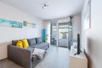 TV a/nebo společenská místnost v ubytování Sunbeach Apartment La Tejita