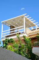 Balkón alebo terasa v ubytovaní Bella's Rustic Suites