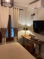 Posteľ alebo postele v izbe v ubytovaní Bella's Rustic Suites