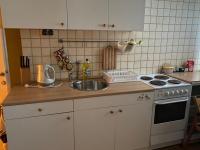 Kuchyňa alebo kuchynka v ubytovaní Apartament u Maliny