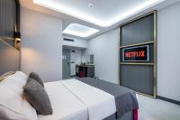 Postel nebo postele na pokoji v ubytování 216 Prestige Hotel