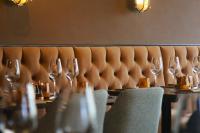 a long table with wine glasses on it at Coach & Horses Dersingham in Dersingham