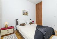 Posteľ alebo postele v izbe v ubytovaní Apartment Zvone