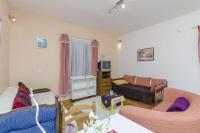 Televízia a/alebo spoločenská miestnosť v ubytovaní Apartment Zvone