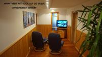 Televízia a/alebo spoločenská miestnosť v ubytovaní Apartment Schloemicher Leopold und Birgitt
