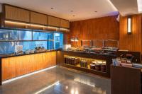 Xiamen Zhongshan Road Pedestrian Street Qulistar Hotelにあるキッチンまたは簡易キッチン