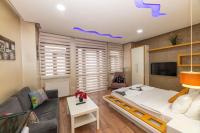 A bed or beds in a room at Taksim Trend Residence