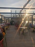 A restaurant or other place to eat at Sundeck botel - party boat