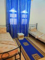 Postel nebo postele na pokoji v ubytování Résidence SUN SHINE DJERBA