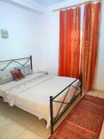 Postel nebo postele na pokoji v ubytování Résidence SUN SHINE DJERBA