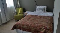 Postel nebo postele na pokoji v ubytování Corner Hotell