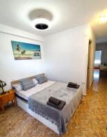 A bed or beds in a room at Apartamento MIRAMAR