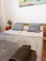 A bed or beds in a room at Apartamento MIRAMAR
