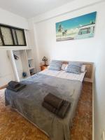 A bed or beds in a room at Apartamento MIRAMAR