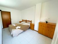 Postel nebo postele na pokoji v ubytování Apartamentos Jaca Ciudadela 3000