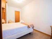 Postel nebo postele na pokoji v ubytování Apartamentos Jaca Ciudadela 3000