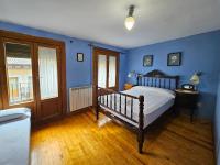 Postel nebo postele na pokoji v ubytování Apartamentos Jaca Ciudadela 3000