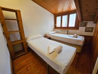 Postel nebo postele na pokoji v ubytování Apartamentos Jaca Ciudadela 3000