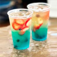 two drinks with fruit in them sitting on a table at Hotel Larú spa resort in La Palma