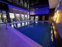 Bazén v ubytovaní Resort Holiday Home Centrum Opieki i Rehabilitacji alebo v jeho blízkosti