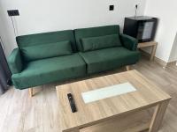 A seating area at La Posada del Teatro H Boutique Parking Gratis