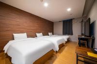Incheon Airport Hotel Seattleにあるベッド