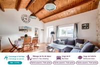 Posedenie v ubytovaní Maison avec jardin à 200m de la plage La Cantine